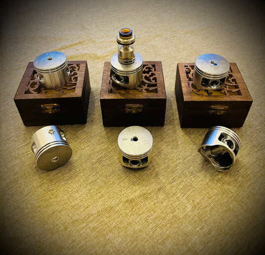 an original piston build stand with bearings rings and a 510 fitment