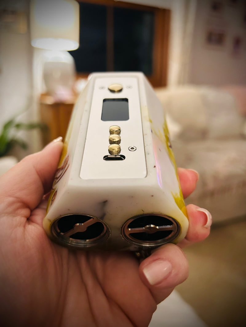 An Evolv Dna250c Twin 21700 battery stabwood Mod stainless steel and brass switches